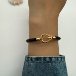 دستبند امگا چرم مشکی